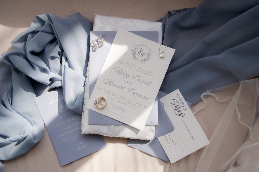 Cangemi dusty blue suite flaylay from photographer