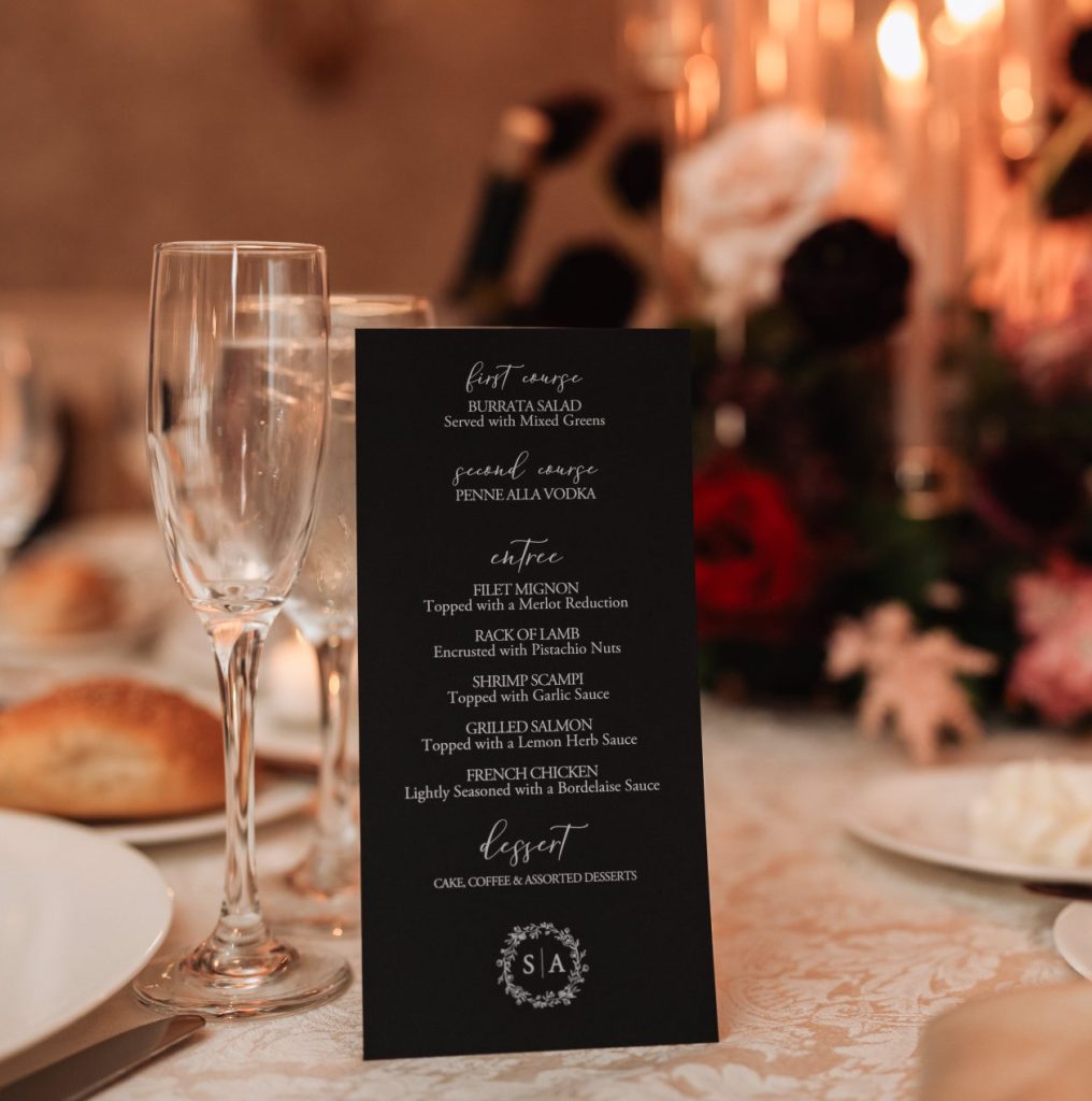 Black cardstock menu with white text